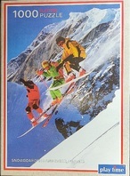 Snowboarders and skier, France